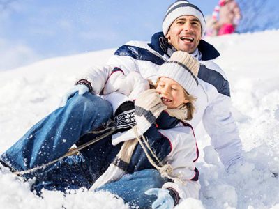 Descente en luge père fils